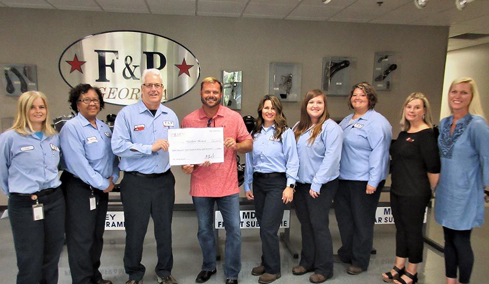 Harbor House accepts donation from F & P Georgia